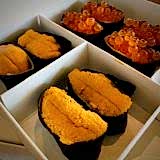 Uni and Ikura sushi in to-go box